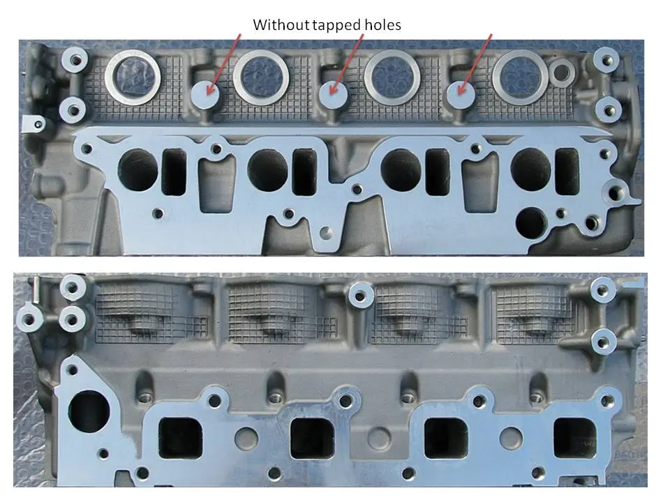 Nissan Cylinder Head YD25-B assembly 8 port early non common rail. Glow plugs on the ex side.